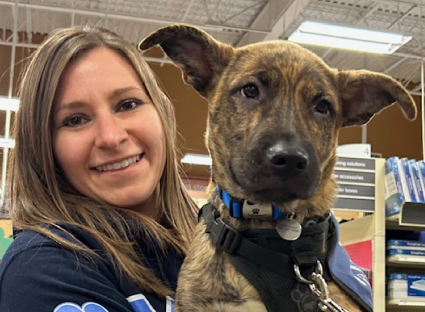 Woman holding a dog